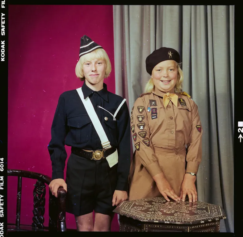 Picture of two children in scouts and brownie uniforms